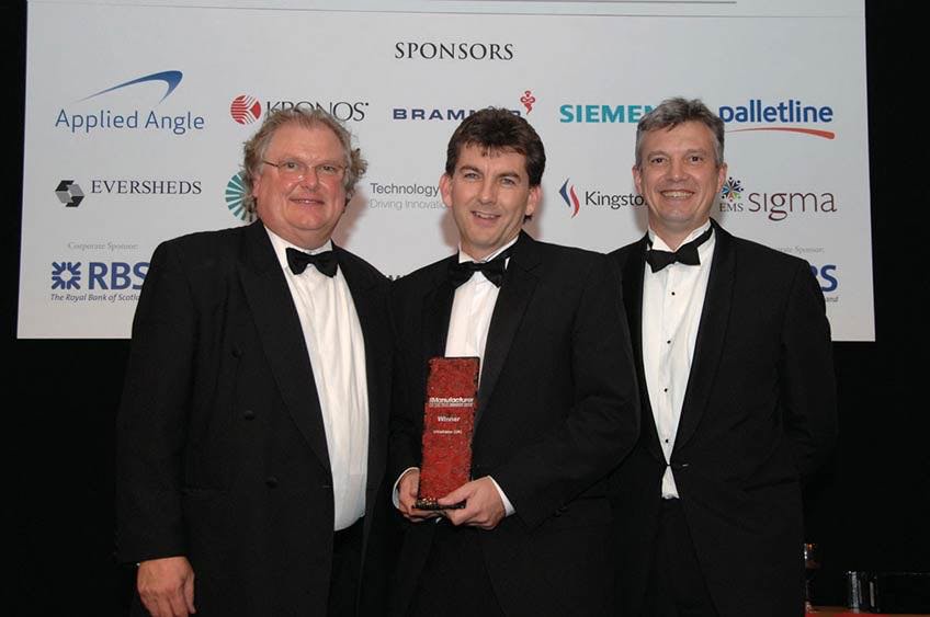Darren Saunders (centre) from Ultraframe being presented with the Financial Management award by Lord Digby Jones (left) former Director General of the CBI and David Beswick, Partner at Eversheds the event sponsors.