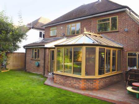 Ultraframe Victorian conservatory in Irish Oak